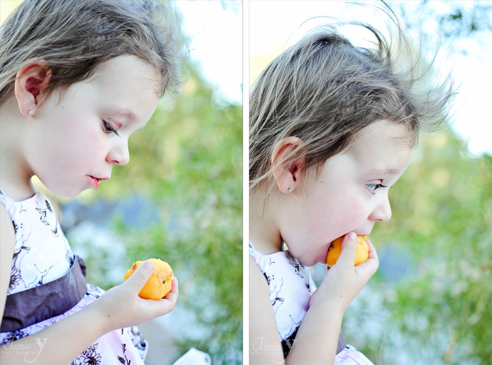3 year old girl eating a peach las vegas photographer