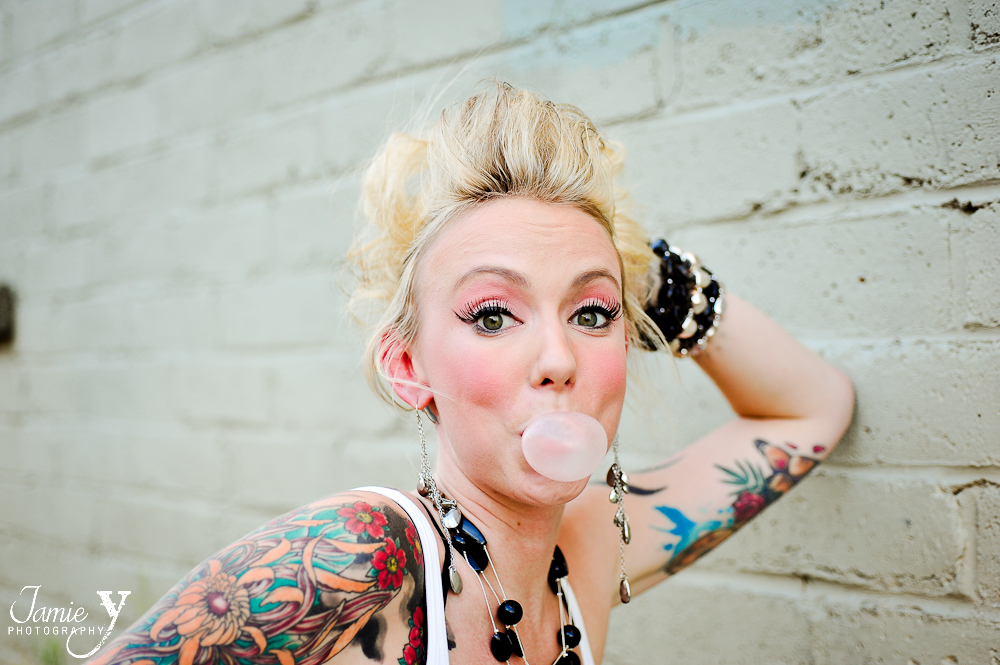 tattooed bride in las vegas blowing bubble gum