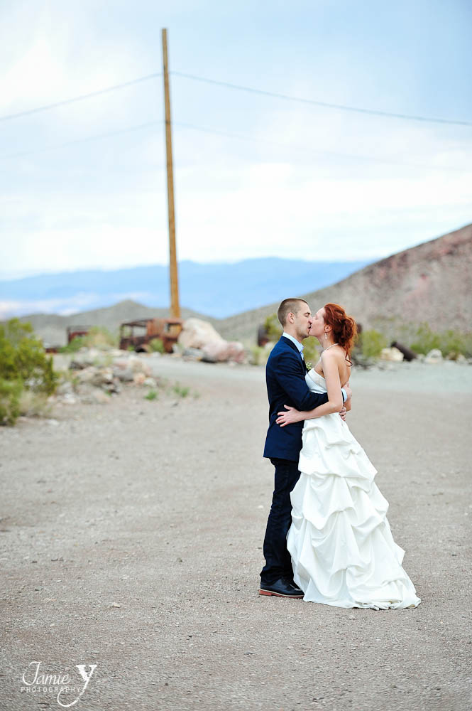 bride and groom kissing in  middle of street in nelson nevada