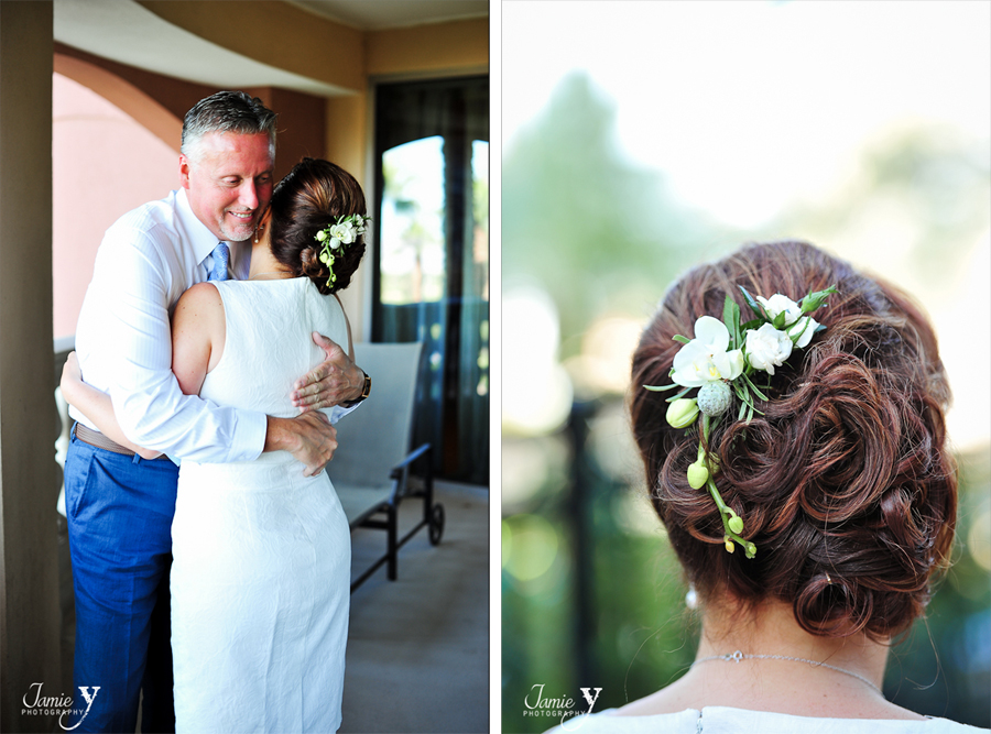 beautiful bridal up-do with flowers and curls