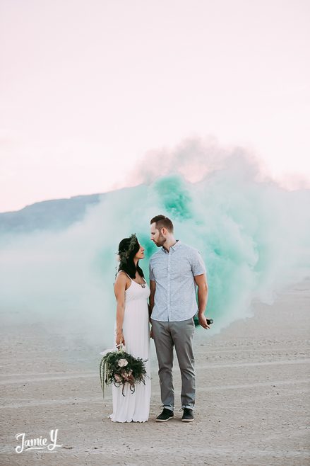 boho bride with smoke bombs