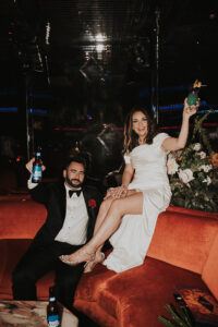 bride and groom having drinks at the peppermill in las vegas