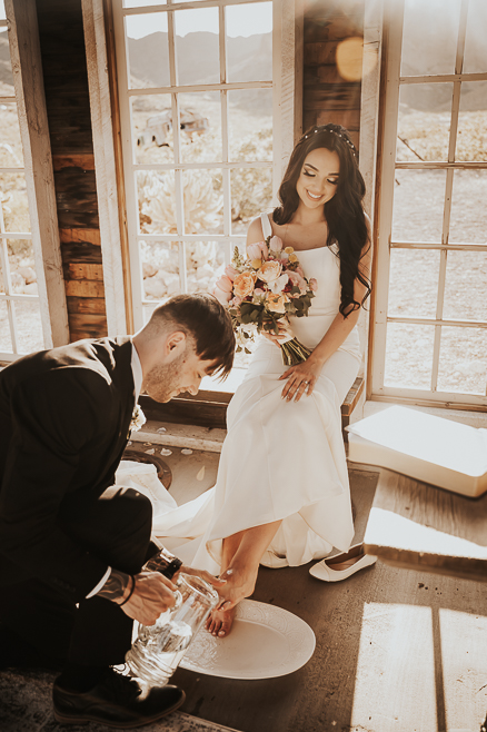 bride during a foot washing ceremony in nelson nevada