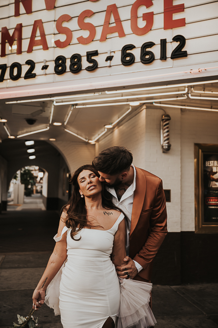 sexy picture of bride and groom in front of the el cortez in downtown las vegas