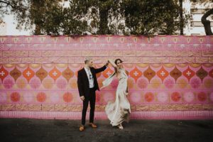 bride and groom walking downtown las vegas