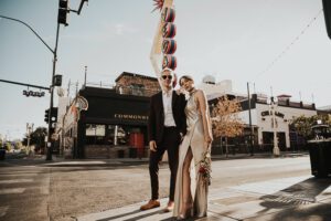 bride and groom walking downtown las vegas