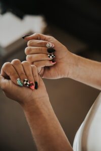 bride with blink 182 inspired wedding day nails