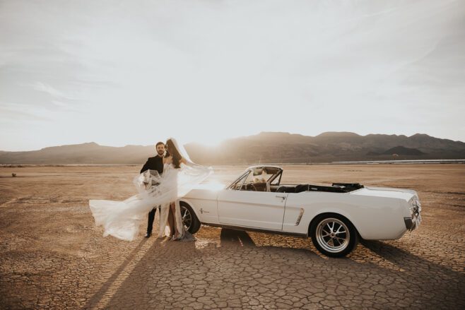 spring wedding in las vegas at the dry lake bed with a vintage car